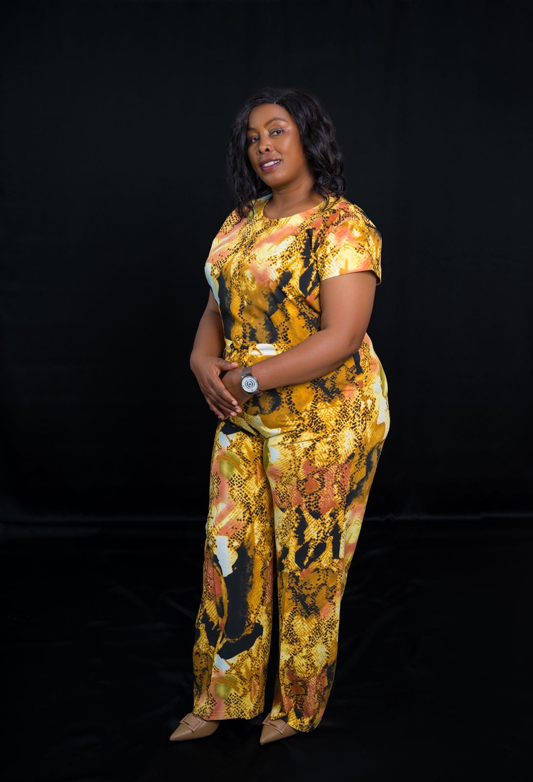 Elegant Abstract-Print Full-Length Jumpsuit with Belted Waist & Wide Legs